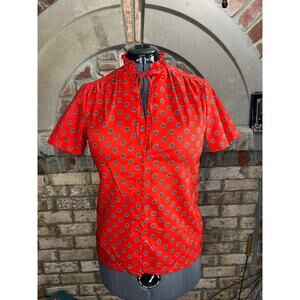 button up blouse ruffle collar tie neck red blue geometric